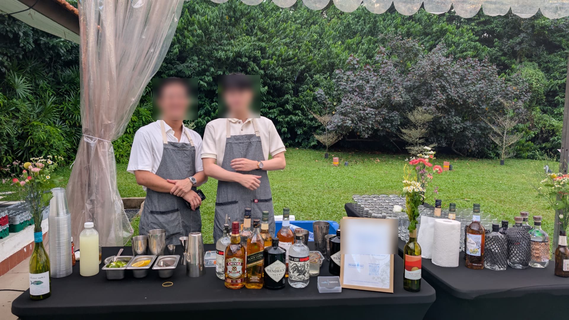 Garden wedding mobile bartending setup in Singapore with bartenders, premium spirits and glassware